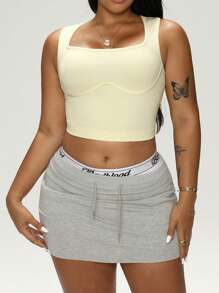 Easithlete Débardeur de sport sans coutures jaune pâle avec dos nageur pour femme grande taille