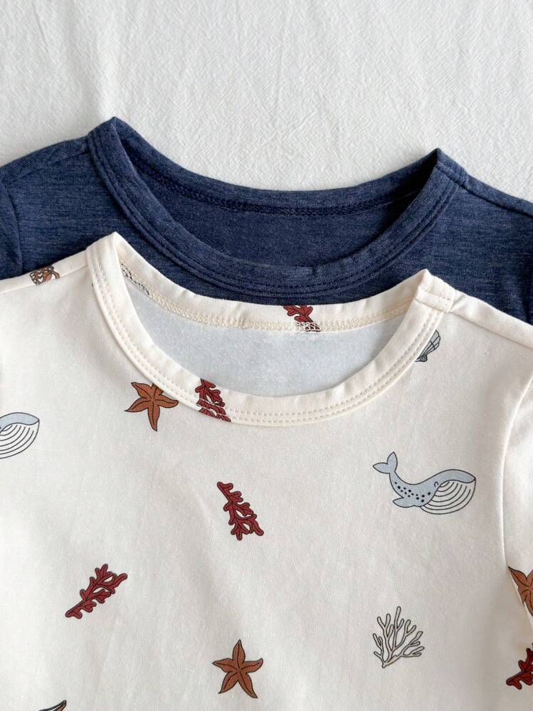 أطقم ملابس علوية بياقة دائرية قصيرة الأكمام والشور...