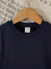 Jong meisje marineblauwe gebreide patchwork geruite jurk met schattige strikdecoratie, frisse stijl casual vakantie mode jurk voor meisjes