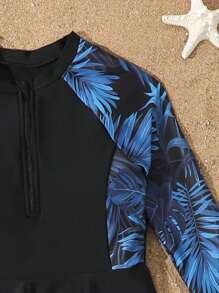 SHEIN Conjunto de 2 piezas de biquini para niñas preadolescentes: Top tipo chaleco sin mangas con estampado floral, cierre con cremallera; Bottom: Falda negra con estampado floral de retazos, traje de baño de dos piezas