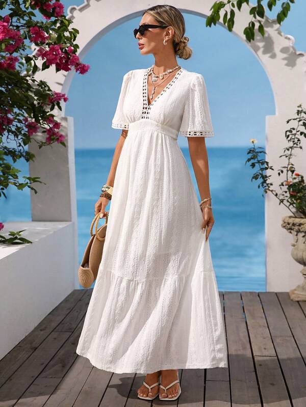 Vivid Eden Robe avec col V texturée géométrique à manches bouffantes, convenant pour les vacances