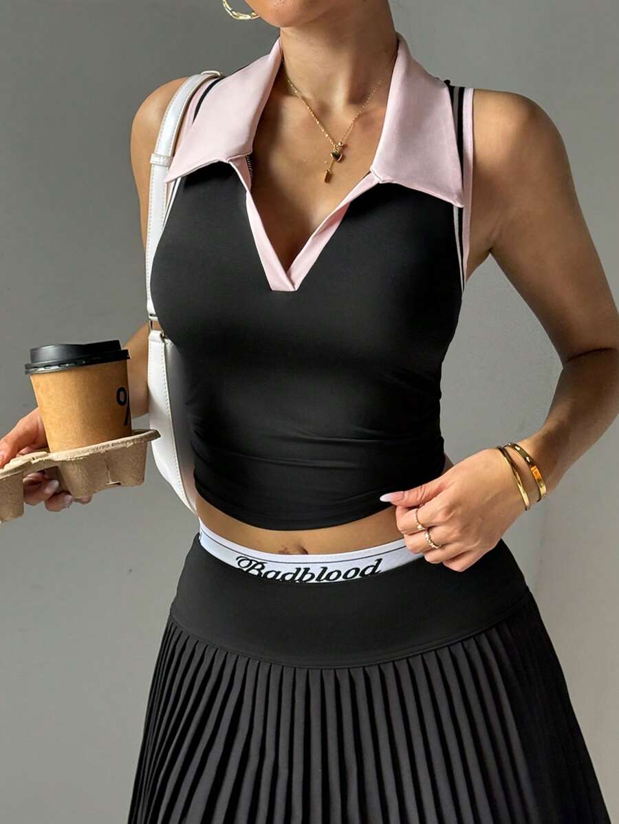 Easithlete Women's Spring/Summer Colorblock Stripe Ribbed Trim Polo Shirt - Black - View 1