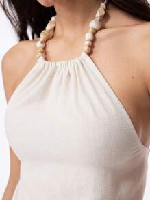 LYSMO 2025春夏新品，女士高端时尚露背短款上衣，亚麻面料精制而成，饰有串珠绳饰。完美契合复古休闲、田园风美学、休闲度假造型和波西米亚风情。 - 杏色 - 查看 8