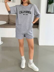 EURMUSE 女士纯色针织两件套短袖圆领前印花宽松修身款和侧袋松紧腰短款周末休闲放松时光服装