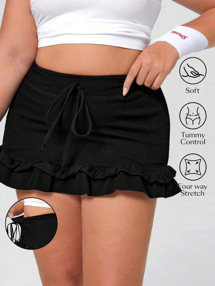 Flexra Minifalda de mezclilla de punto con volantes, elástica y de talla grande - Negro - Ver 1