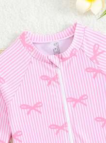 Sparklyn 女宝宝粉色蝴蝶结印花荷叶边长袖连体泳衣，具有 UPF 防护功能