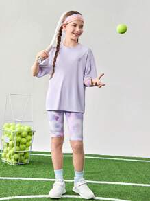 JNSQ T-shirt de sport professionnel pour extérieur pour préadolescentes retournant à l'école, t-shirt de sport ample à col rond pour enfants avec patchwork en maille et impression réfléchissante 3M