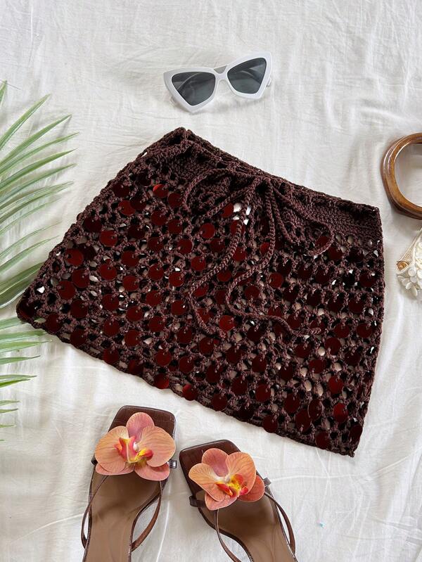 Soleia Women Elegant Bohemian Tropical Crocheted Bowknot Drawstring Sequin Mini Skirt, Suitable For Casual, Beach, Wedding Guest, Graduation, Brunch, St. Patrick's Day, Spring Break, Easter, Music Festival Sequin Crochet Brown Sweater Skirt Crochet Skirt Sequin Skirt Beach Cover Up Skirt Crochet Beach Skirt