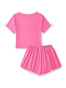 Conjunto de 2 piezas para adolescentes: Camiseta de cuello redondo de manga corta con decoración de lazo para niños y conjunto de pijama corto con estampado de corazón para niñas