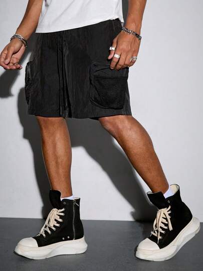 Casual شورت رجالي بخصر مربوط مع جيب بلون واحد فضفاض