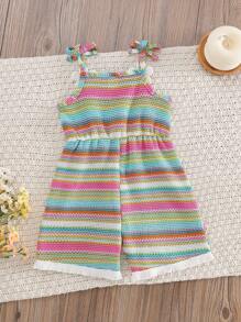 SHEIN Vintaside Kids قطعة واحدة رومبر بدون أكمام للبنات الصغار مزين بتطريز ثلاثي الأبعاد على شكل زهور، خصر مرتفع، قماش ناعم ومريح، جمبسوت قفزة مزينة بشرائط نمط مطبعة بالورود بطراز قديم، متعددة الاستخدامات وأنيقة للشاطئ والسفر والاستخدام اليومي ، وصول جديد لفصل الصيف