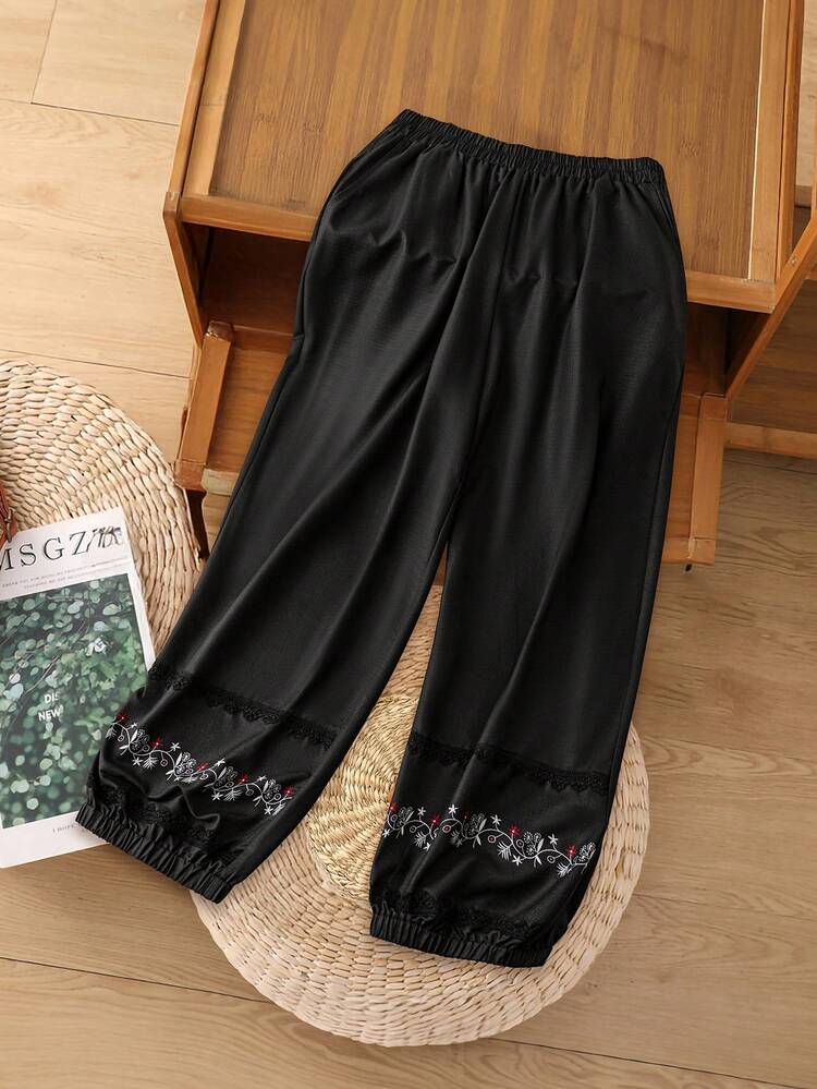 SHEIN LUNE بنطلون بتصميم سهل وفضفاض مع طباعة وساق متضيقة للأحجام الكبيرة - الأسود - مشاهدة 3