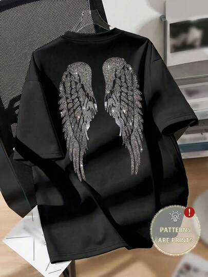 SHEIN 女士加大码休闲白色图案超大 T 恤，带有闪亮天使翅膀设计，短袖圆领上衣，适合春夏季