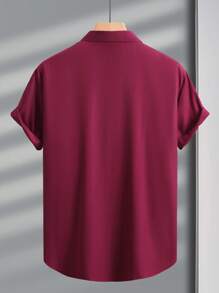 Manfinity Mode Camisa casual de manga corta de un solo pecho de unicolor para hombres, ideal para el verano