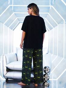Rick and Morty X SHEIN Set pigiama oversize con stampa a cartoni animati, composto da top a maniche corte e pantaloni lunghi - nero - Visualizzare 2