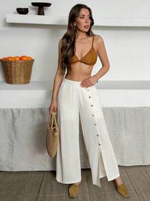 SHEIN Calças largas de linho com detalhe assimétrico de botões e bainha dividida, estilo casual de verão, estilo boho