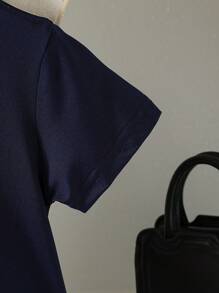 Jong meisje marineblauwe gebreide patchwork geruite jurk met schattige strikdecoratie, frisse stijl casual vakantie mode jurk voor meisjes