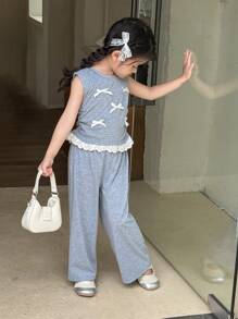 Zikori Little Byeori 年轻女孩休闲蝴蝶结装饰和荷叶边下摆T恤和裤子套装 - 灰色 - 查看 5
