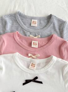 Cozy Pixies Set de 3 blusas de manga corta con cuello de tripulación de punto suave de unicolor para niña bebé, con moño decorativo, camiseta linda - Rosa - Ver 5