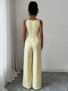 Elenzga Elegante mono de pierna ancha con decoración de lazo en los hombros y estampado floral de margaritas en tela de brocado, adecuado para el uso diario