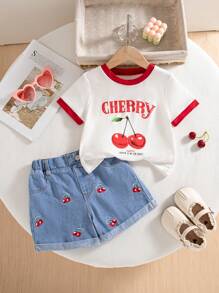 Conjunto de blusa de cuello redondo con ribete de contraste estampado de cerezas y shorts vaqueros con puños para niñas, informal y dulce, ropa de verano, atuendo de vaquera