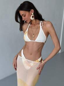 Aloruh Set Bikini Rajut 2 Potong Wanita: Atasan Crop Mikro Tanpa Lengan Model Halter dengan Tali Belakang dan Rok Pantai Semi-Transparan Pinggang Tinggi dan Pinggang Rendah - Biru - View 1