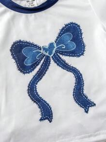 SHEIN Conjunto de 4 piezas de top de manga corta y pantalones cortos con patrón de moño para niñas bebés, de verano - Multicolor - Ver 6