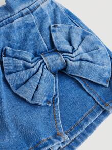 女孩休閒整體褲裙,帶有融合包裝裝飾的牛仔布款式