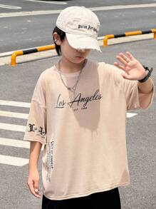 1 Piece Tween Boy 休闲运动学院艺术风格复古宽松版型个性字母印花圆领卡其色 T 恤适合返校男孩适合生日派对、晚会、表演、婚礼、洗礼、开幕式日常适合日常使用适合上学适合旅行适合运动适合春夏季节 - 卡其色 - 查看 1