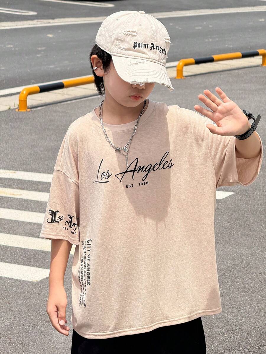 1 Piece Tween Boy 休闲运动学院艺术风格复古宽松版型个性字母印花圆领卡其色 T 恤适合返校男孩适合生日派对、晚会、表演、婚礼、洗礼、开幕式日常适合日常使用适合上学适合旅行适合运动适合春夏季节 - 卡其色 - 查看 1