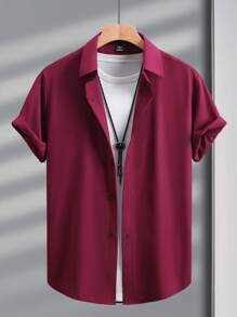 Manfinity Mode Camisa casual de manga corta de un solo pecho de unicolor para hombres, ideal para el verano