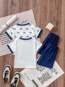 SHEIN Conjunto de 4 piezas de top de manga corta y pantalones cortos con patrón de moño para niñas bebés, de verano - Multicolor - Ver 3