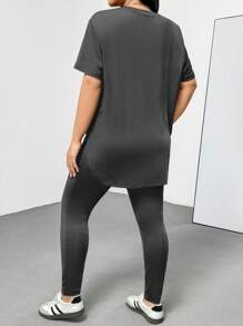 Shapeblank Bộ đồ thể thao giản dị mùa xuân và mùa hè cỡ lớn cho nữ, thoải mái, cơ bản, đa năng, giảm béo hàng ngày, áo phông tay ngắn màu đen và quần legging hai mảnh, bộ quần, trang phục đường phố, trang phục sân bay, trang phục mùa hè cho phụ nữ, trang phục đi chơi, quần áo Y2k, phong cách tối giản, trang phục nhà thờ cho phụ nữ - Màu xám đen - Xem 2