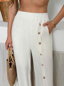 SHEIN Calças largas de linho com detalhe assimétrico de botões e bainha dividida, estilo casual de verão, estilo boho