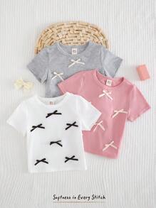 Cozy Pixies Set de 3 blusas de manga corta con cuello de tripulación de punto suave de unicolor para niña bebé, con moño decorativo, camiseta linda - Rosa - Ver 4