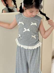 Zikori Little Byeori 年轻女孩休闲蝴蝶结装饰和荷叶边下摆T恤和裤子套装 - 灰色 - 查看 1