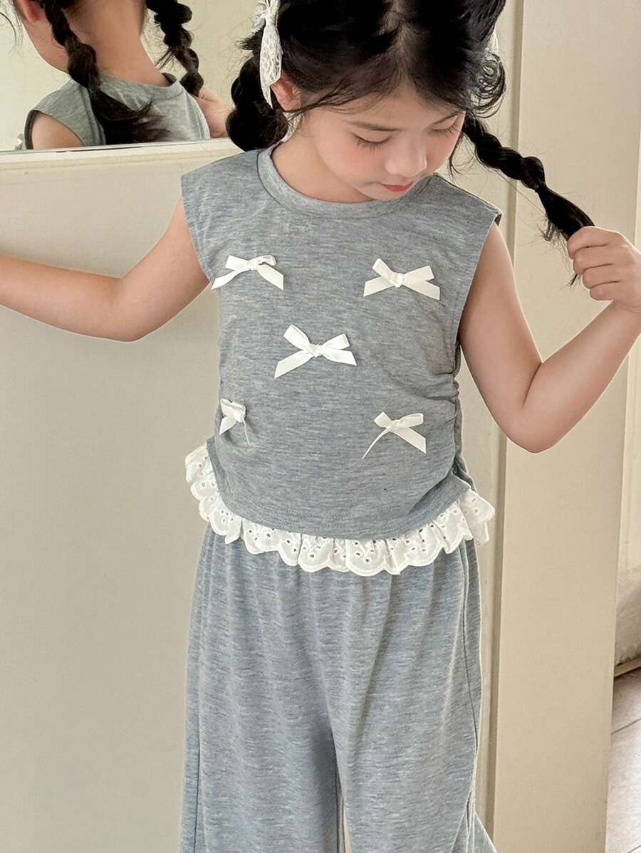 Zikori Little Byeori 年轻女孩休闲蝴蝶结装饰和荷叶边下摆T恤和裤子套装 - 灰色 - 查看 1