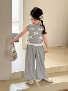 Zikori Little Byeori 年轻女孩休闲蝴蝶结装饰和荷叶边下摆T恤和裤子套装 - 灰色 - 查看 6
