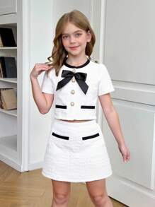 SHEIN Serisse Kids Conjunto elegante de 2 piezas para niña preadolescente, con blusa de tela de tweed con decoración de lazos y botones de perlas imitadas, y falda corte A, estilo dama elegante francés, para volver al colegio