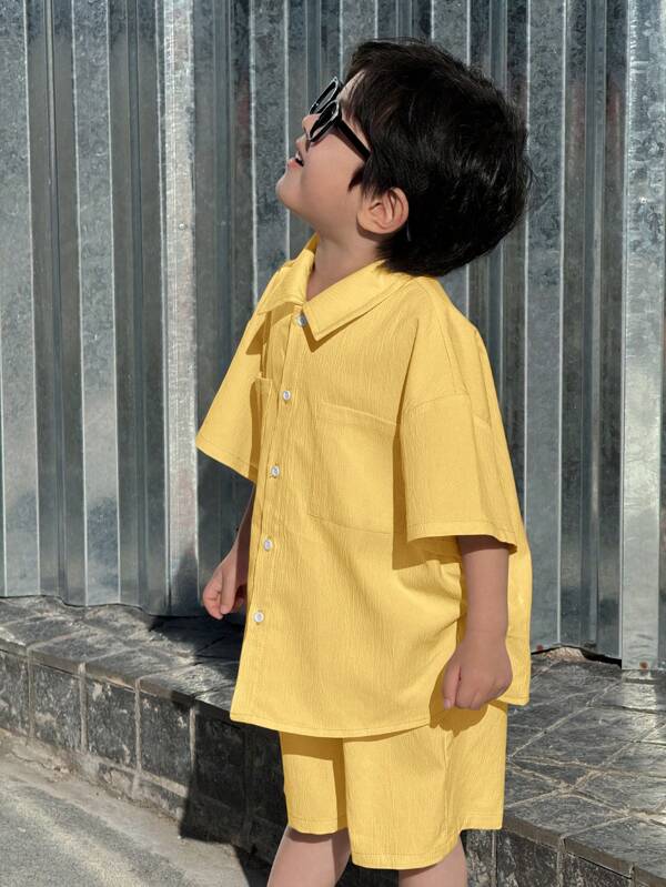 Set de 2 piezas de camisa de manga corta holgada con cuello y bolsillos de estilo coreano casual para niños, con pantalones cortos de cintura elástica de unicolor, adecuado para escuela, fiestas, actuaciones, bodas, bautizos, uso diario, primavera y verano