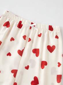 2 pezzi Set di pigiama da donna e ragazza adolescente con stampa a cuore, top a maniche lunghe e pantaloni lunghi
