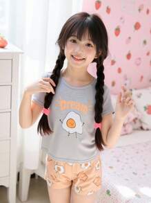 SHEIN 2 piezas Conjunto de pijama holgado de punto con camiseta de manga corta cuello redondo y pantalones cortos con estampado de dibujos lindos para niña, ropa de verano para el hogar