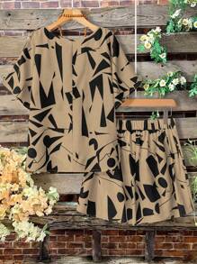 Linhara Ensemble femme grande taille 2 pièces, top à col ras-du-cou à manches courtes et imprimé géométrique, shorts amples avec nœud papillon. Tenue d'été mode, décontractée et élégante pour la maison