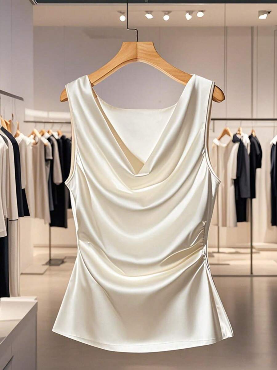 Franclia 优雅简约别致的垂褶领口、褶裥腰身黄色缎面女式上衣