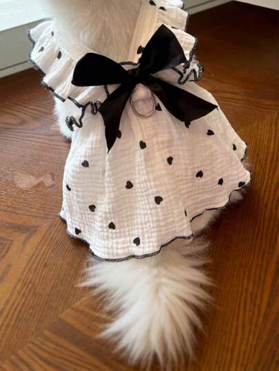 Pet Dresses And Supplies For Spring And Summer, Suitable For Dogs And Cats Like Teddy, Bichon Frise, And Pomeranian. Features Include Cute Love-Themed Dog Outfits.