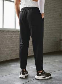 Manfinity BRENVOR Pantalones deportivos casuales de hombre, tejidos, holgados, con cordón en la cintura