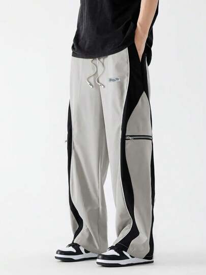 Manfinity Sport Corelite 男士撞色拉链装饰抽绳腰斜插口袋运动裤，吸汗轻便舒适阔腿简约设计修身版型，适合锻炼休闲健身穿着。