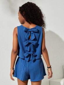 Conjunto de 2 piezas para niña preadolescente con top azul casual de cuello redondo con textura y lazo en la espalda, y shorts a juego