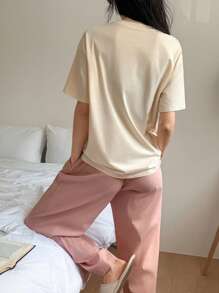 DAZY Conjunto de pijama para mujer con Top de camiseta holgada con estampado de dibujos animados lindos y pantalones de unicolor