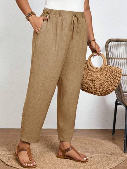 SHEIN Frenchy Pantalones casuales de talla grande de unicolor con cintura elástica y bolsillos en diagonal